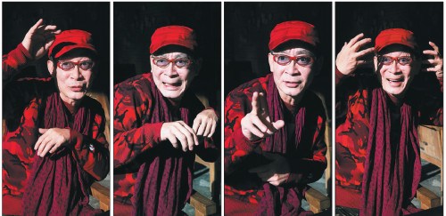 Zhang Jinlai, 57, better known as Liu Xiao Ling Tong, mimics a monkey's facial expressions. Zhang is a fourth-generation monkey opera performer in his family. (Photo: China Daily/Jiang Dong)