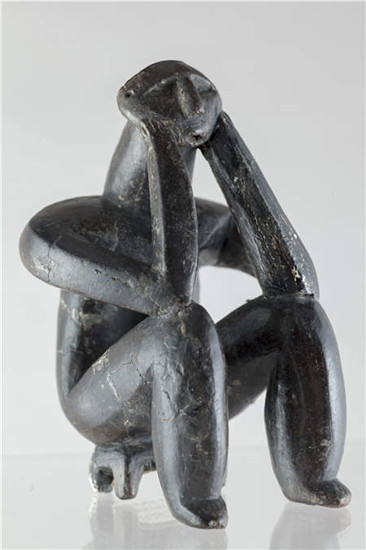 Exhibits from Treasures of Romania include a figurine, the thinker, unearthed from a Neolithic grave in 1956. Photos Provided to China Daily