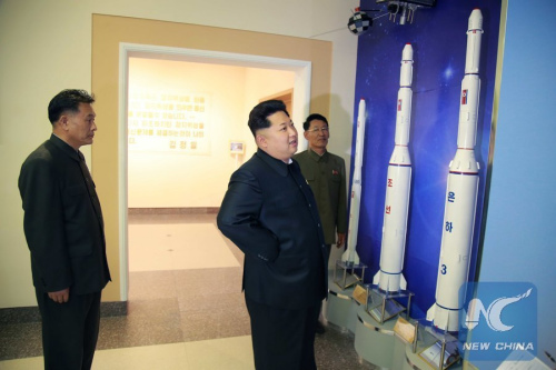 Photo provided by Korean Central News Agency (KCNA) on May 3, 2015 shows top leader of the Democratic People's Republic of Korea (DPRK) Kim Jong Un (R, front) inspecting the newly-built General Satellite Control and Command Center of the National Aerospace Development Administration (NADA).  (Photo: Xinhua/KCNA) 