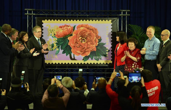 Photo taken on Feb. 5, 2016 shows the official first-day-of-issue dedication ceremony of the Year of the Monkey Commemorative Forever Stamp at St. John's University Queens Campus in New York, the United States. (Photo: Xinhua/Wang Lei)