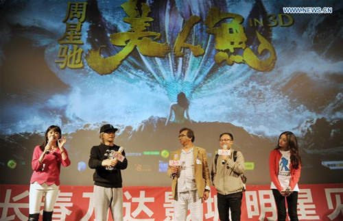 Director Stephen Chow (2nd L) and cast members of movie The Mermaid attend a fans meeting in Changchun, capital of northeast China's Jilin Province, Feb. 16, 2016. (Photo: Xinhua/Lin Hong)