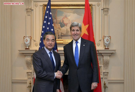 U.S. Secretary of States John Kerry (R) meets with Chinese Foreign Minister Wang Yi in Washington D.C., the United States, Feb. 23, 2016. (Photo: Xinhua/Yin Bogu)