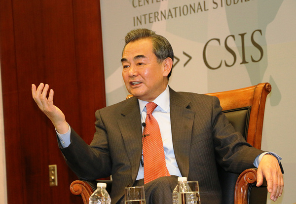 Chinese Foreign Minister Wang Yi talks about China-U.S. relations and China's economic development in the Statemen's Forum at the Center for Strategic and International Studies in Washington on Thursday. During his U.S. visit, which began on Monday and ended on Thursday, Wang met with U.S. President Barack Obama, Secretary of State John Kerry and other top U.S. government and opinion leaders, and discussed important bilateral, regional and global issues. (Photo by Chen Weihua/China Daily)