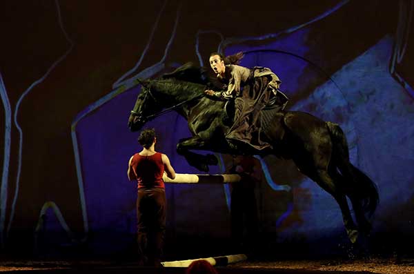 The show Cavalia features dozens of horses and riders, and aerialists, acrobats, dancers and musicians.(Photo provided to China Daily)