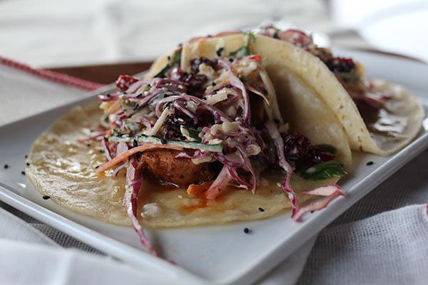 American Piper Stremmel collects recipes from chefs in Shanghai, where she lived for more than two years, to come up with the book Shanghai Chefs: A Cookbook. (Photo provided to China Daily)