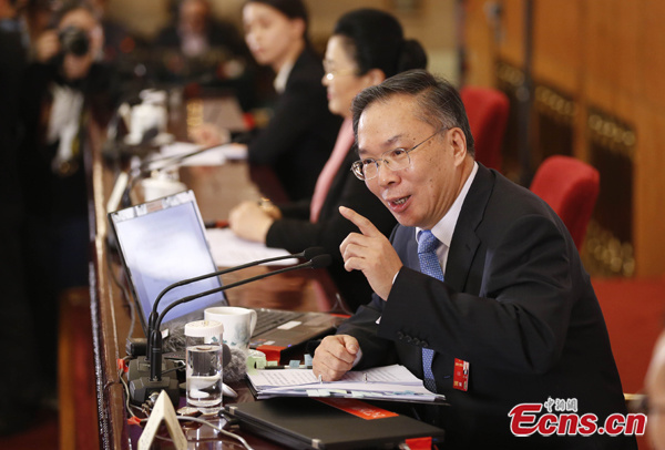 Wang Guoqing, new spokesman of China's top meeting of political advisors, speaks at the first press conference of the Chinese People's Political Consultative Conference in Beijing, March 2, 2016. (Photo: China News Service/Du Yang)