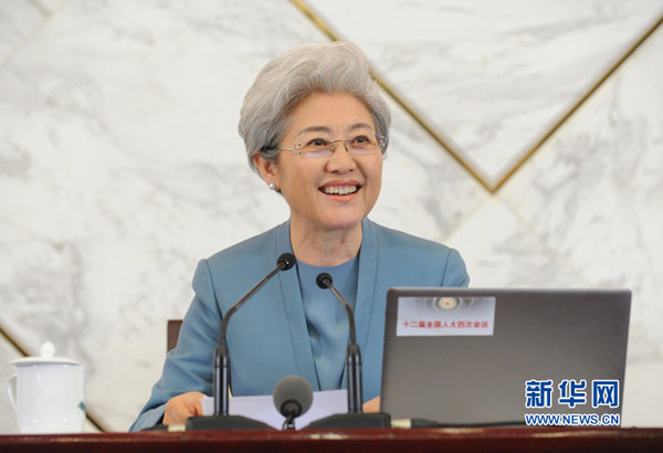 Fu Ying, spokesperson for the fourth session of China's 12th National People's Congress (NPC), answers questions during a press conference on the session at the Great Hall of the People in Beijing on Friday. The fourth session of the 12th NPC is scheduled to open on Saturday. Photo/Xinhua