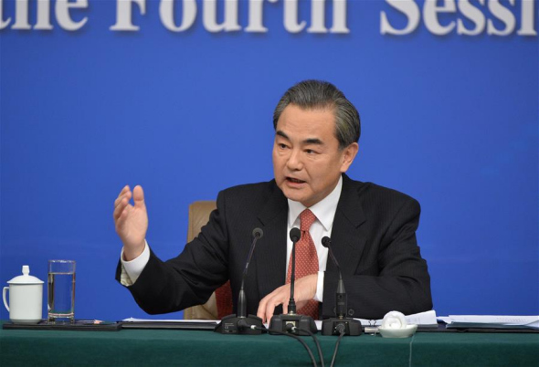 Chinese Foreign Minister Wang Yi answers questions at a press conference on the sidelines of the fourth session of China's 12th National People's Congress in Beijing, capital of China, March 8, 2016. Wang talked about China's foreign policy on international and regional issues. (Xinhua/Li Xin)