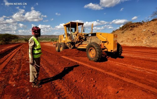 Construction machines work on the Turbi-Moyale road in Kenya's northern county of Marsabit, March 5, 2016. (Photo: Xinhua/Zhou Xiaoxiong)