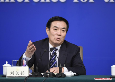 Liu Changming, a member of the 12th National Committee of the Chinese People's Political Consultative Conference, answers questions at a press conference on the development of people's livelihood in Beijing, capital of China, March 9, 2016. (Photo: Xinhua/Chen Yichen)
