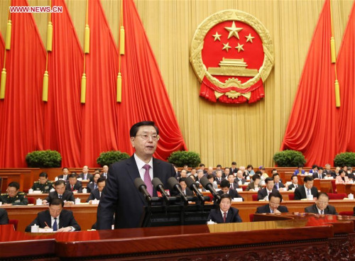 Zhang Dejiang, chairman of the Standing Committee of China's National People's Congress (NPC), delivers a report on the work of the NPC Standing Committee during the second plenary meeting of the fourth session of the 12th NPC at the Great Hall of the People in Beijing, capital of China, March 9, 2016. (Photo: Xinhua/Yao Dawei)