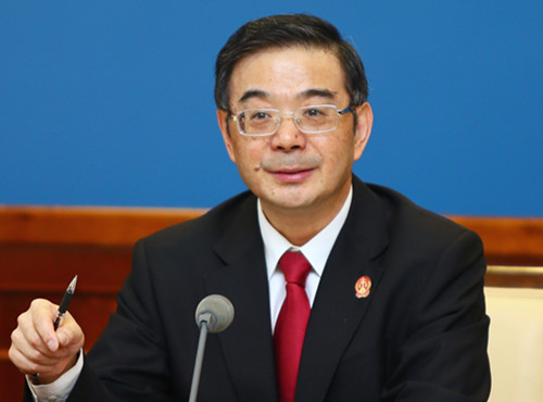 Zhou Qiang, president of the Supreme People's Court, asks courts to better handle disputes involving foreigners. Sun Ruofeng / for China Daily