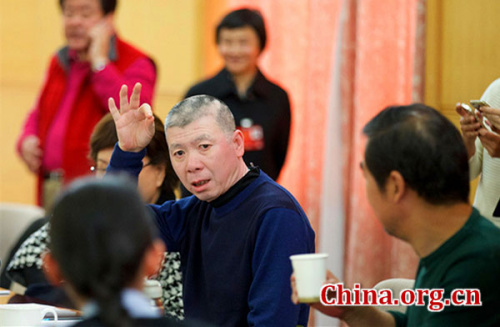 Feng Xiaogang, a director and member of the 12th National Committee of the Chinese People's Political Consultative Conference (CPPCC), speaks at a meeting during the ongoing annual session of the top political advisory body on March 7, 2016 in Beijing. (Photo: China.org.cn/Wu Wenda)