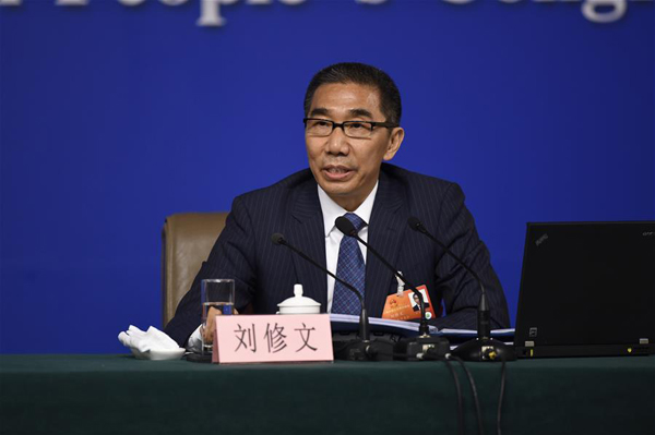 Liu Xiuwen, deputy director of the Budgetary Affairs Commission of the National People's Congress (NPC) Standing Committee, answers questions at a press conference on the supervision of the NPC on the sidelines of the fourth session of the 12th NPC in Beijing, capital of China, March 11, 2016. (Xinhua/Chen Yichen)