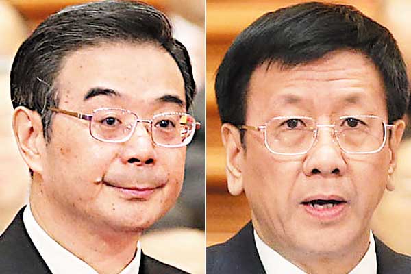 Zhou Qiang (left), president of the Supreme People's Court, and Cao Jianming, prosecutor-general at the Supreme People's Procuratorate