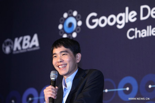  South Korean professional Go player Lee Sedol smiles at the press conference after the third round match of the Google DeepMind Challenge Match between Lee Sedol and Google's artificial intelligence program, AlphaGo, in Seoul, South Korea, March 13, 2016. Lee Sedol won the third round match Sunday. (Xinhua/Yao Qilin)