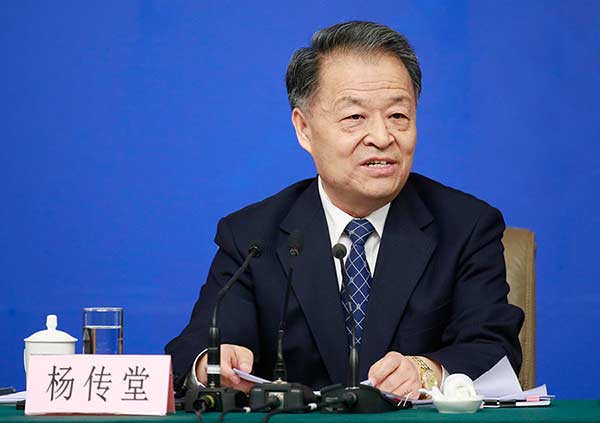 Chinese Minister of Transport Yang Chuantang attends a press conference on reform and development of taxis on the sidelines of the fourth session of the 12th National People's Congress in Beijing, March 14, 2016. (Photo: chinadaily.com.cn/Feng Yongbin)