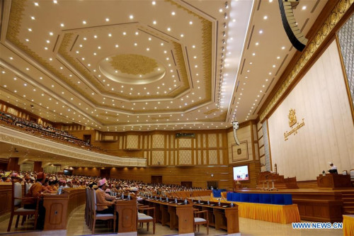 Representatives attend a session at the Union Parliament in Nay Pyi Taw, Myanmar, March 15, 2016. U Htin Kyaw of Myanmar's ruling National League for Democracy (NLD), led by Aung San Suu Kyi, won the presidential election Tuesday with the highest number of votes through secret voting, becoming the country's new president for the next five-year term. (Xinhua/U Aung)