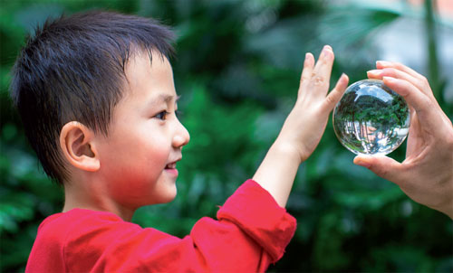 This young boy was one of the participants in the cataract study. He had cataract surgery at 6 months old and is now 2 years old. (Photo provided to China Daily)