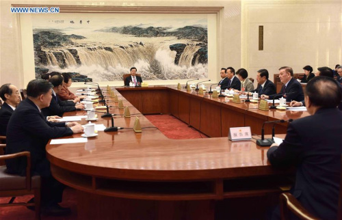 Zhang Dejiang, executive chairperson of the presidium of the fourth session of China's 12th National People's Congress (NPC) and chairman of the NPC Standing Committee, presides over the third meeting of the presidium's executive chairpersons at the Great Hall of the People in Beijing, capital of China, March 15, 2016. (Xinhua/Rao Aimin)