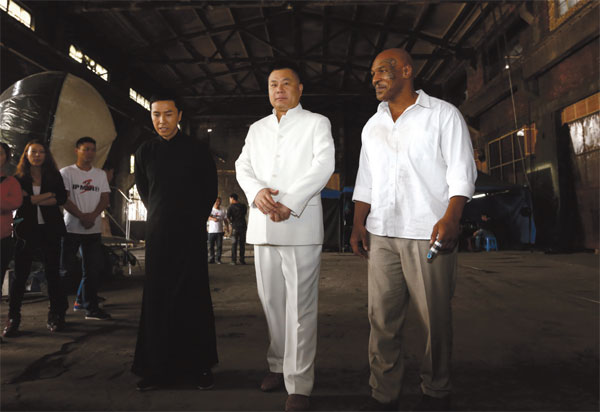 Chinese kungfu star Donnie Yen (left), Ip Man 3's main investor Shi Jianxiang (middle) and Mike Tyson meet the press on May 16 at a film studio in Shanghai, where part of the upcoming film about Bruce Lee's teacher is being shot. (Provided to China Daily)
