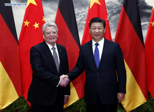 Chinese President Xi Jinping (R) holds talks with visiting German President Joachim Gauck at the Great Hall of the People in Beijing, capital of China, on March 21, 2016. (Xinhua/Ju Peng)