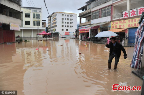 A low-lying area floods after heavy rainfall in Meizhou City, South Chinas Guangdong Province, March 21, 2016. Two people are dead and more than 3,000 people have been affected by the floods, which have also caused economic losses of 3 million yuan ($463,000). Heavy rain in Guangdong and the neighboring Guangxi region over the past two days has seen water levels in some rivers and reservoirs rise to warning levels. (Photo/CFP)