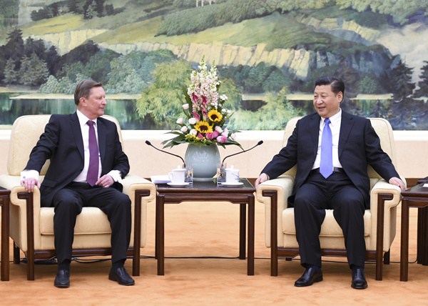 Chinese President Xi Jinping (right) meets with Russian Presidential Administration chief Sergei Ivanov at the Great Hall of the People in Beijing, March 25, 2016. (Photo/Xinhua)