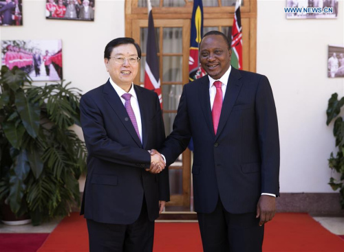 Zhang Dejiang (L), chairman of the Standing Committee of China's National People's Congress (NPC), meets with Kenyan President Uhuru Kenyatta in Nairobi, Kenya, March 24, 2016. Zhang paid an official goodwill visit to Kenya on March 23-26. (Xinhua/Ma Zhancheng)