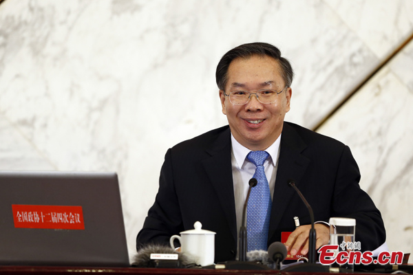 Wang Guoqing, spokesman with China's national political advisory body, speaks at a press conference of the Chinese People's Political Consultative Conference in Beijing, March 2, 2016. (Photo: China News Service/Sheng Jiapeng)