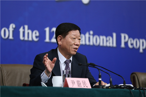 Yin Weimin, Minister of Human Resources and Social Security, speaks at a press conference at the annual session of the National People's Congress in Beijing, March 9, 2016. (Photo/Xinhua)