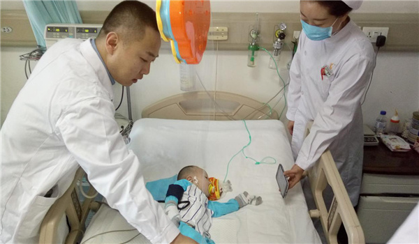 The boy after heart surgery. (Photo/www.chinajilin.com.cn)