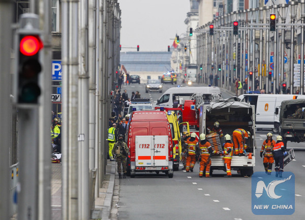 Rescuers and security personnels work outside the Maalbeek railway station in Brussels, Belgium, on March 22, 2016. (Xinhua/Zhou Lei) Rescuers and security personnels work outside the Maalbeek railway station in Brussels, Belgium, on March 22, 2016. (Xinhua/Zhou Lei)