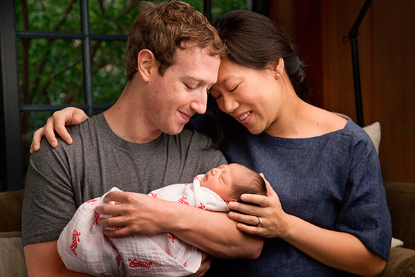 Mark Zuckerberg and his wife holding their newborn daughter. (Photo/ provided to China Daily)