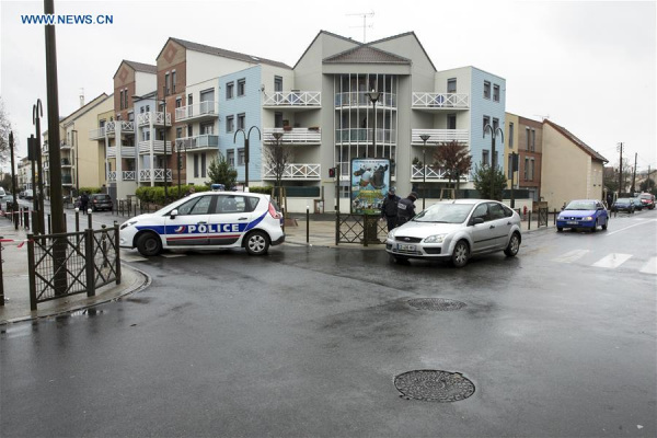 Police officers and investigators search a flat during an anti-terrorist operation in Argenteuil, near Paris, France on March 25, 2016. One person was arrested and several controlled detonations were carried out during a major police operation in the Brussels district of Schaerbeek on Friday afternoon, local media reported. (Xinhua/Theo Duval)