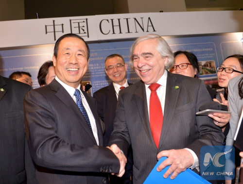 U.S. Secretary of Energy Ernest Moniz(R) and Xu Dazhe (L), head of China Atomic Energy Authority (CAEA) visit the Chinese Pavilion during the Security Summit at at the Walter E. Washington Convention Center in Washington, D.C., March 31, 2016. The Summit is scheduled for March 31-April 1, 2016. (Xinhua/Yin Bogu)