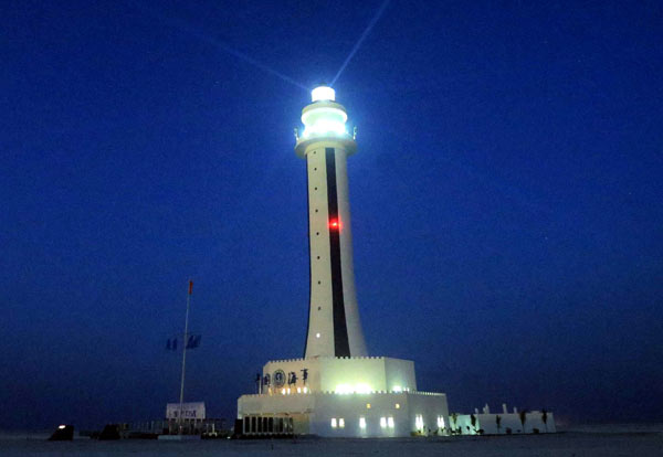The lighthouse on Zhubi Reef in the South China Sea is now in use. XING GUANGLI / XINHUA