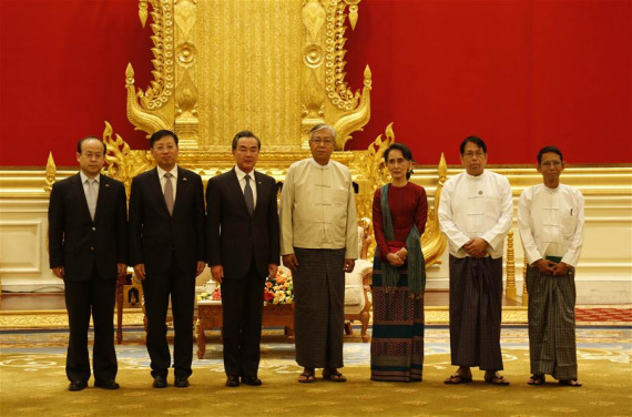 Chinese Foreign Minister Wang Yi (3rd, L), Myanmar President U Htin Kyaw (4th, R) and Foreign Minister Aung San Suu Kyi (3rd, R) pose for group photos in Nay Pyi Taw, Myanmar, on April 6, 2016. (Photo: Xinhua/U Aung)