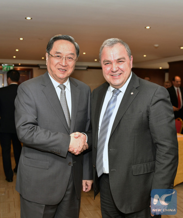Yu Zhengsheng (L), chairman of the National Committee of the Chinese People's Political Consultative Conference (CPPCC), shakes hands with Anglu Farrugia, speaker of the House of Representatives of Malta, in Valletta, Malta, April 10, 2016. (Photo: Xinhua/Gao Jie)