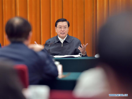 Zhang Dejiang, chairman of the Standing Committee of China's National People's Congress, presides over a plenary session of the inspection group for the enforcement of the food safety law in Beijing, capital of China, April 12, 2016. (Xinhua/Li Tao)