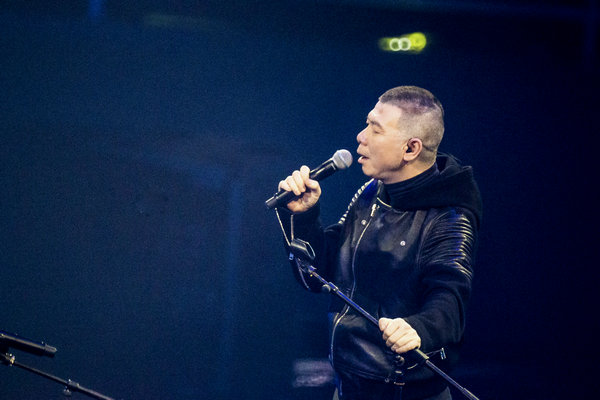 Feng Xiaogang performs at a Beijing concert, themed on the movie Mr Six, in which he plays the lead role. (Photo provided to China Daily) 