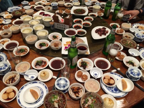 Chengdu, the ancient gateway to the southern Silk Road, has long been a magnet for visitors who love food. Dinner at Shunxing Teahouse. (Photo: Mike Peters/China Daily)