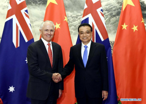Chinese Premier Li Keqiang (R) meets with Australian Prime Minister Malcolm Turnbull during the fourth annual talks between the two countries' prime ministers in Beijing, capital of China, April 14, 2016. Turnbull is paying his first official visit to China since taking office in September 2015, with a large business delegation. (Xinhua/Rao Aimin)