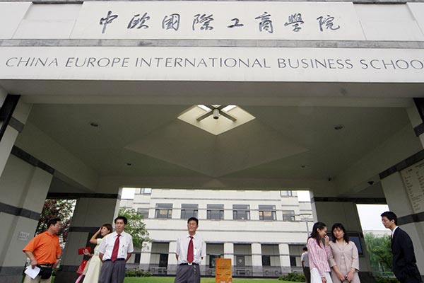 People at the entrance of the China Europe International Business School. HE ZI / FOR CHINA DAILY