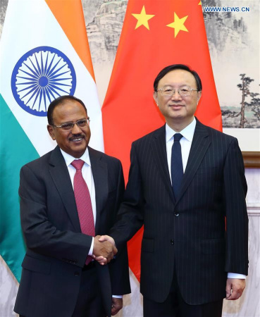 Chinese State Councilor Yang Jiechi (R), who is also Chinese special representative on China-India boundary issues, meets with his Indian counterpart, Indian National Security Adviser Ajit Doval in Beijing, capital of China, April 20, 2016. The 19th round of talks between special representatives on China-India boundary issues was held here on Wednesday. (Xinhua/Ding Haitao)