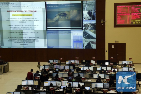 Image taken on Nov. 28, 2015 shows officials of different ministries and secretariats of security taking part in a preventive meeting of the Emergency Operations Committee (COE), at the headquarters of the ECU 911, in Quito, capital of Ecuador. (Photo: Xinhua/Santiago Armas)