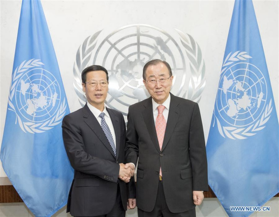 Chinese Vice Premier Zhang Gaoli (L) shakes hands with UN Secretary-General Ban Ki-moon at the UN headquarters in New York, the United States, April 21, 2016. Zhang will attend the Paris climate agreement signing ceremony on April 22 as Chinese President Xi Jinping's special envoy. (Photo: Xinhua/Wang Ye)