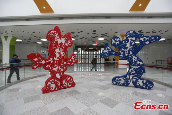 The Disney Resort Station on Shanghais Metro Line 11, April 25, 2016. Some trains on the line will have Disney elements painted their interiors and exteriors as well as at the station. The theme park in Shanghai, Disney's first on the Chinese mainland, will open on June 16. (Photo: China News Service/Zhang Hengwei)