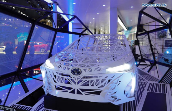 A Toyota hybrid car model is seen at Beijing International Automotive Exhibition in Beijing, capital of China, April 25, 2016. The exhibition attracted more than 1,600 exhibitors from 14 countries and regions. (Photo: Xinhua/Chen Jianli)