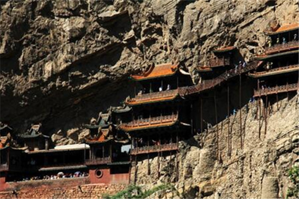 Built on a sheer precipice of Mount Heng, the Hanging Temple has again been unveiled after six months shrouded by scaffolding.